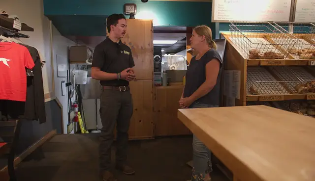 Element plumber meeting with a local business owner