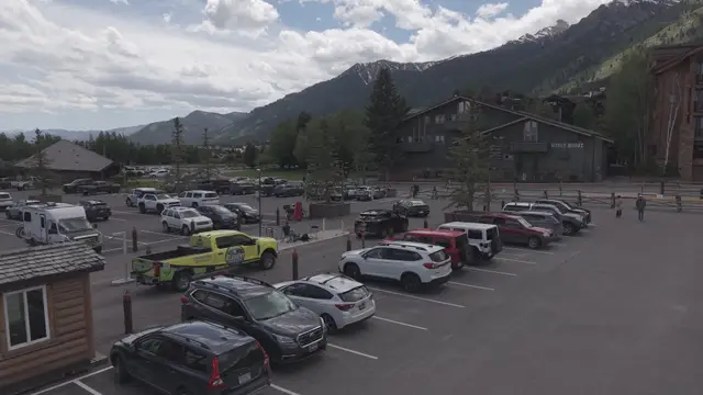 Element Plumbing truck parked in town below the mountains
