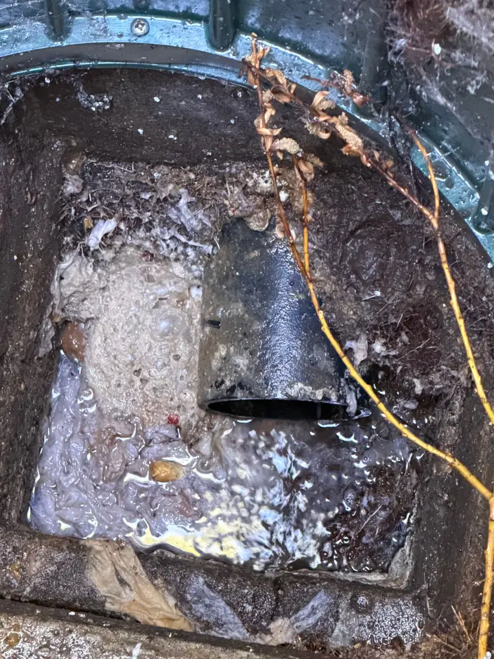 Sewer lift station basin with its cleanout line