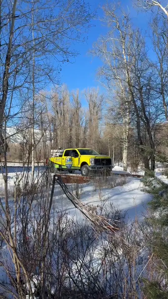 Element Plumbing service truck in a snowy Jackson Hole driveway
