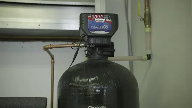 Water softener tank with a digital control valve