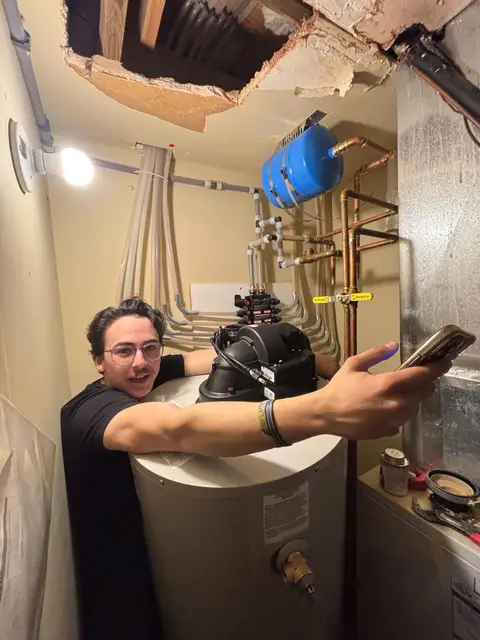 Element plumber with a newly installed water heater
