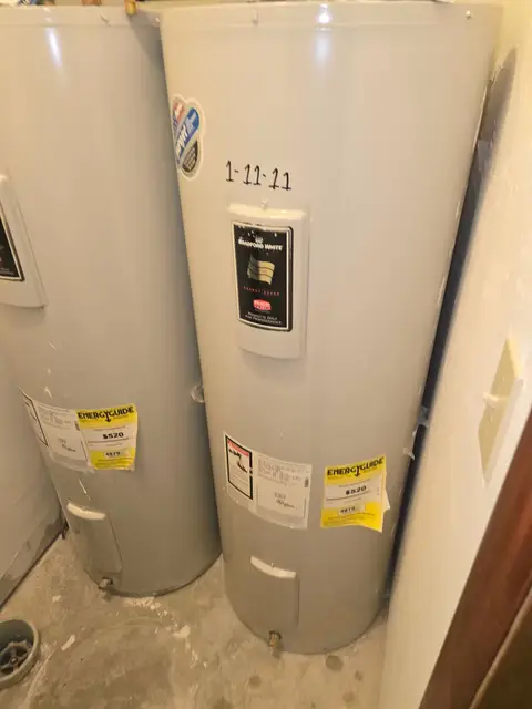 New water heaters installed in a utility closet