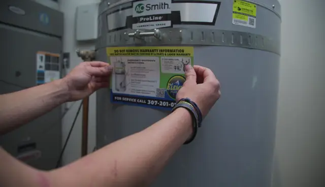 Element service label applied to a commercial water heater