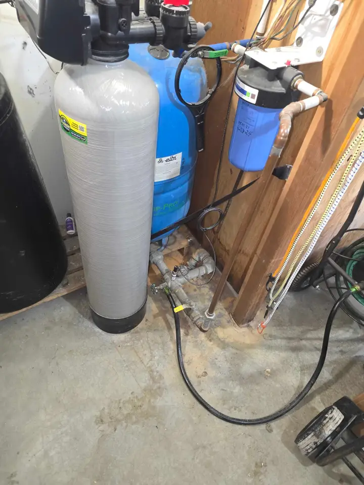 Water softener and filter installed on a home water supply