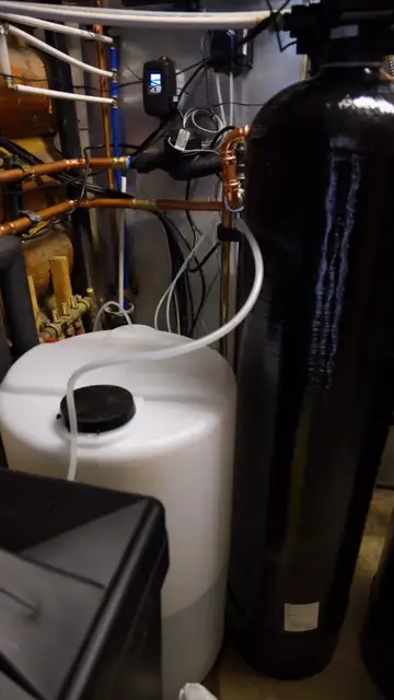 Water treatment system with media tank and brine tank